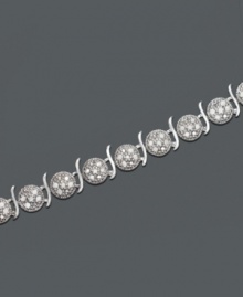 A superb amount of sparkle in a stately tennis bracelet. Crafted in sterling silver, bracelet features round circles packed with round-cut diamonds (1 ct. t.w.). Approximate length: 7-1/2 inches. A superb amount of sparkle in a stately tennis bracelet. Crafted in sterling silver, bracelet features round circles packed with round-cut diamonds (1 ct. t.w.). Approximate length: 7-1/2 inches.