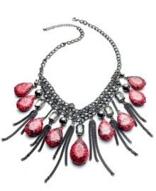 Take a walk on the wild side. Style&co.'s fierce statement necklace bites back with plastic beads with snakeskin vinyl and smoky metal fringe. Crafted in hematite tone mixed metal. Approximate length: 18 inches + 2-inch extender. Approximate drop: 7 inches. Take a walk on the wild side. Style&co.'s fierce statement necklace bites back with plastic beads with snakeskin vinyl and smoky metal fringe. Crafted in hematite tone mixed metal. Approximate length: 18 inches + 2-inch extender. Approximate drop: 7 inches.