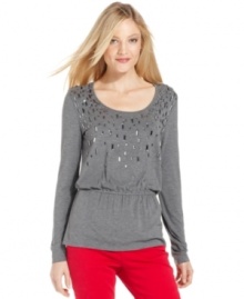 Turn up the shine in Jones New York Signature's pretty beaded tunic. The peplum waist lends a flattering and on-trend touch. Turn up the shine in Jones New York Signature's pretty beaded tunic. The peplum waist lends a flattering and on-trend touch.