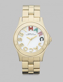 Colorful crystals accent the logo dial on this simply chic, stainless steel style. Quartz movementWater resistant to 5 ATMRound goldtone ion-plated stainless steel case, 40mm (1.6) Smooth bezelWhite dialCrystal accented and smooth logo hour markersSecond hand Goldtone ion-plated stainless steel link braceletImported Colorful crystals accent the logo dial on this simply chic, stainless steel style. Quartz movementWater resistant to 5 ATMRound goldtone ion-plated stainless steel case, 40mm (1.6) Smooth bezelWhite dialCrystal accented and smooth logo hour markersSecond hand Goldtone ion-plated stainless steel link braceletImported