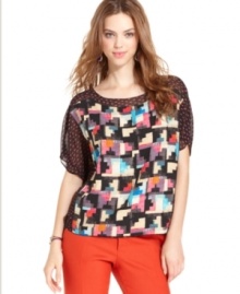 In contrasting mixed prints, this RACHEL Rachel Roy top is perfect for adding a modern edge to your fall look! In contrasting mixed prints, this RACHEL Rachel Roy top is perfect for adding a modern edge to your fall look!