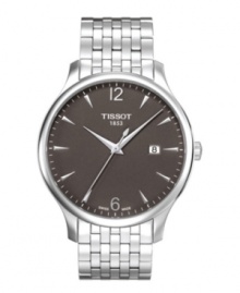 As dependable as it is eye-catching, this Tissot timepiece brings everyday style. Tradition collection watch crafted of stainless steel bracelet and round case. Black dial features silver tone applied stick indices, minute track, date window at three o'clock, numerals at twelve and six o'clock, three hands and logo. Swiss quartz movement. Water resistant to 30 meters. Two-year limited warranty. As dependable as it is eye-catching, this Tissot timepiece brings everyday style. Tradition collection watch crafted of stainless steel bracelet and round case. Black dial features silver tone applied stick indices, minute track, date window at three o'clock, numerals at twelve and six o'clock, three hands and logo. Swiss quartz movement. Water resistant to 30 meters. Two-year limited warranty.