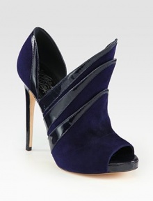 Crafted by artisans of layered suede with patent leather trim, this peep toe ankle boot is unapologetically bold. Patent leather-covered heel, 5 (125mm)Hidden platform, ¾ (20mm)Compares to a 4¼ heel (110mm)Suede upper with patent leather trimPeep toeLeather lining and solePadded insoleImported Crafted by artisans of layered suede with patent leather trim, this peep toe ankle boot is unapologetically bold. Patent leather-covered heel, 5 (125mm)Hidden platform, ¾ (20mm)Compares to a 4¼ heel (110mm)Suede upper with patent leather trimPeep toeLeather lining and solePadded insoleImported