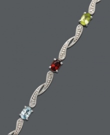 Add swirling sparkle and drops of color to liven up your ensemble. Victoria Townsend bracelet features oval-cut amethyst (3/4 ct. t.w.), blue topaz (1 ct. t.w.), citrine (3/4 ct. t.w.), garnet (1-1/10 ct. t.w.), peridot (8/10 ct. t.w.) and diamond accents. Set in sterling silver. Approximate length: 7 inches. Add swirling sparkle and drops of color to liven up your ensemble. Victoria Townsend bracelet features oval-cut amethyst (3/4 ct. t.w.), blue topaz (1 ct. t.w.), citrine (3/4 ct. t.w.), garnet (1-1/10 ct. t.w.), peridot (8/10 ct. t.w.) and diamond accents. Set in sterling silver. Approximate length: 7 inches.