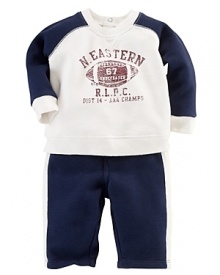 This coordinating athletic set includes a classic crewneck fleece pullover and matching sweatpant with contrast stripes for an authentic sporty look.