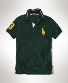 A trim-fitting short-sleeved polo shirt is crafted from breathable cotton mesh in a handsome striped pattern with signature embroidery. A trim-fitting short-sleeved polo shirt is crafted from breathable cotton mesh in a handsome striped pattern with signature embroidery.