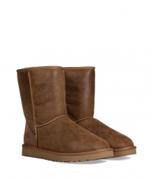Stylishly distressed and undeniably cozy, these vintage-inspired shearling boots from UGG Australia lend comfort and style to your cold weather look - Round toe, rugged rubber sole, exposed seams, side button detail, contrasting back counter suede panel, cozy shearling lining, weathered finish - Hits above the ankle - Pair with favorite jeans, bright knits, and sporty outerwear Stylishly distressed and undeniably cozy, these vintage-inspired shearling boots from UGG Australia lend comfort and style to your cold weather look - Round toe, rugged rubber sole, exposed seams, side button detail, contrasting back counter suede panel, cozy shearling lining, weathered finish - Hits above the ankle - Pair with favorite jeans, bright knits, and sporty outerwear