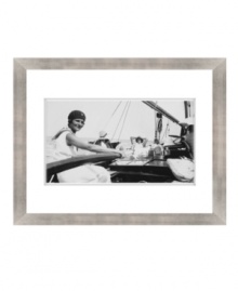 From working the rudder to lounging in the sun, this vintage art print shows the many sides of sailing in classic black and white. Matted and framed with a breezy sensibility for seaside homes. From working the rudder to lounging in the sun, this vintage art print shows the many sides of sailing in classic black and white. Matted and framed with a breezy sensibility for seaside homes.
