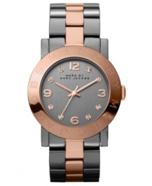 Flaunting signature style, this Marc by Marc Jacobs watch adds glamour to the workday. Flaunting signature style, this Marc by Marc Jacobs watch adds glamour to the workday.