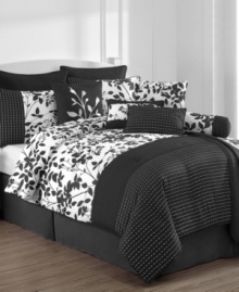 Black, white and chic all over! The Audrey comforter set boasts a silhouette leaf print with embroidered dots for an undeniably stylish look with a fresh, modern allure. This expansive set includes a reversible coverlet for lightweight warmth as well as five coordinating decorative pillows. (Clearance)
