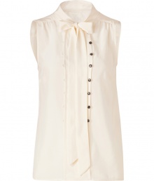 Detailed with a button and looped front panel (which lets you decide how tailored you want to wear it), Marc by Marc Jacobs sleeveless silk top is a unique feminine staple with endless wearing possibilities - Stand-up collar with tie, V-neckline, sleeveless, gathered yolk, front panel with button and loop detail, pull-over style - Loosely fitted - Wear with a boyfriend blazer, dark-wash skinnies and heels Detailed with a button and looped front panel (which lets you decide how tailored you want to wear it), Marc by Marc Jacobs sleeveless silk top is a unique feminine staple with endless wearing possibilities - Stand-up collar with tie, V-neckline, sleeveless, gathered yolk, front panel with button and loop detail, pull-over style - Loosely fitted - Wear with a boyfriend blazer, dark-wash skinnies and heels
