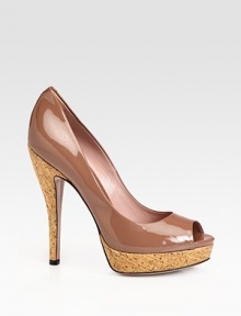 Patent leather open toe silhouette with a cork heel and platform. Cork heel, 5¼ (130mm)Cork platform, 1¼ (30mm)Compares to a 4 heel (100mm)Patent leather upperPeep toeLeather lining and solePadded insoleMade in Italy Patent leather open toe silhouette with a cork heel and platform. Cork heel, 5¼ (130mm)Cork platform, 1¼ (30mm)Compares to a 4 heel (100mm)Patent leather upperPeep toeLeather lining and solePadded insoleMade in Italy