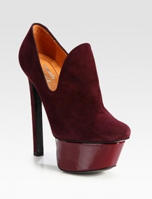A head-turning silhouette of ultra-soft suede with a commanding patent leather island platform. Self-covered heel, 5¾ (145mm)Patent leather island platform, 1¾ (45mm)Compares to a 4 heel (100mm)Suede upperLeather lining and solePadded insoleMade in Italy A head-turning silhouette of ultra-soft suede with a commanding patent leather island platform. Self-covered heel, 5¾ (145mm)Patent leather island platform, 1¾ (45mm)Compares to a 4 heel (100mm)Suede upperLeather lining and solePadded insoleMade in Italy