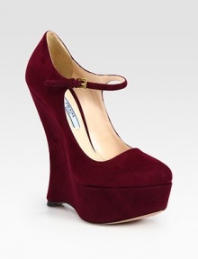 Iconic Mary Jane silhouette rendered in suede with a tall wedge and adjustable ankle strap. Self-covered wedge, 6 (150mm)Covered platform, 1¾ (45mm)Compares to a 4¼ heel (110mm)Suede upperAdjustable ankle strapLeather lining and solePadded insoleMade in Italy Iconic Mary Jane silhouette rendered in suede with a tall wedge and adjustable ankle strap. Self-covered wedge, 6 (150mm)Covered platform, 1¾ (45mm)Compares to a 4¼ heel (110mm)Suede upperAdjustable ankle strapLeather lining and solePadded insoleMade in Italy