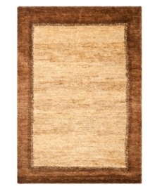 Classic lines of color border a neutral ground in rich, high pile across this contemporary area rug from Lauren Ralph Lauren. Meticulously hand tufted in India of natural jute and hemp fibers for individualized strength and supreme style.