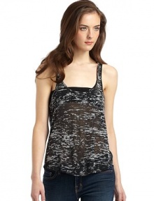 THE LOOKSemi-sheer burnout designScoopneckSleevelessRacerbackTHE FITAbout 23 from shoulder to hemTHE MATERIALPolyester/cotton/rayonCARE & ORIGINMachine washMade in USAModel shown is 5'9 (175cm) wearing US size Small. THE LOOKSemi-sheer burnout designScoopneckSleevelessRacerbackTHE FITAbout 23 from shoulder to hemTHE MATERIALPolyester/cotton/rayonCARE & ORIGINMachine washMade in USAModel shown is 5'9 (175cm) wearing US size Small.