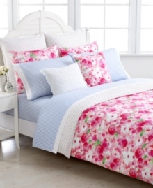 Reminiscent of a quaint backyard garden, Tommy Hilfiger's Rose Cottage duvet cover set features an allover watercolor rose print in a bright pink colorway with pops of green for a picturesque look.