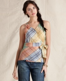 Brighten up summer days with this boho-inspired top from Tommy Hilfiger. Wrap styling with a tie at the waist is instantly flattering! Brighten up summer days with this boho-inspired top from Tommy Hilfiger. Wrap styling with a tie at the waist is instantly flattering!