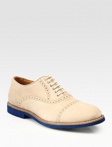 Step lightly in this handsome brogue style design in smooth, perforated suede with a contrast lug sole.Suede upperLeather liningPadded insoleRubber soleMade in Italy Step lightly in this handsome brogue style design in smooth, perforated suede with a contrast lug sole.Suede upperLeather liningPadded insoleRubber soleMade in Italy