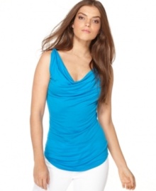 A cowl neckline and seductive twisted straps create drama on a simple, chic tank from Calvin Klein Jeans. A cowl neckline and seductive twisted straps create drama on a simple, chic tank from Calvin Klein Jeans.