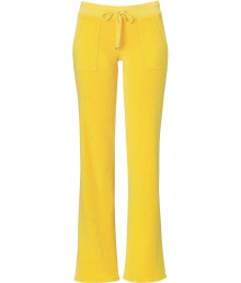 Styled this season with a slightly wider waistband and slimmer cut around the knee, Juicy Coutures iconic pants fit better now than ever! - Drawstring waistline, flared leg, snapped back pockets, shiny gold-toned hardware - Figure-hugging fit, sits low on the hips - Style with a tee and cozy pullover, or for a sportier look, with a matching hoodie and flats Styled this season with a slightly wider waistband and slimmer cut around the knee, Juicy Coutures iconic pants fit better now than ever! - Drawstring waistline, flared leg, snapped back pockets, shiny gold-toned hardware - Figure-hugging fit, sits low on the hips - Style with a tee and cozy pullover, or for a sportier look, with a matching hoodie and flats