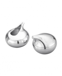 Play with your food. Inspired by the sport of curling, the Kurl sugar and creamer by designer Karim Rashid features fluid curves of beautiful metal that elevate coffee or tea to a work of art. Play with your food. Inspired by the sport of curling, the Kurl sugar and creamer by designer Karim Rashid features fluid curves of beautiful metal that elevate coffee or tea to a work of art.