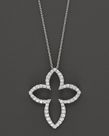 Diamonds set in a 14K. white gold cross pendant. Diamonds set in a 14K. white gold cross pendant.