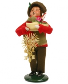 A young boy helps with the holiday shopping, picking up a traditional straw ornament and clog full of goodies in this handcrafted figurine from Byers' Choice. A young boy helps with the holiday shopping, picking up a traditional straw ornament and clog full of goodies in this handcrafted figurine from Byers' Choice.