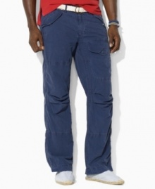 A relaxed-fitting pant in lightweight cotton poplin exudes rugged regality with a button-flap cargo pocket at the leg. A relaxed-fitting pant in lightweight cotton poplin exudes rugged regality with a button-flap cargo pocket at the leg.