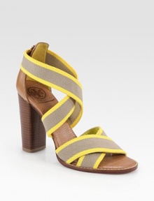 Elevated by a stacked heel, ultra-comfy, two-tone elastic straps top a pebbled leather footbed. Stacked heel, 4 (100mm)Leather and elastic upperLeather lining and solePadded insoleImportedOUR FIT MODEL RECOMMENDS ordering true size. Elevated by a stacked heel, ultra-comfy, two-tone elastic straps top a pebbled leather footbed. Stacked heel, 4 (100mm)Leather and elastic upperLeather lining and solePadded insoleImportedOUR FIT MODEL RECOMMENDS ordering true size.