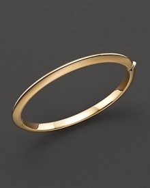 The classic bangle in 18 Kt. gold. Designed by Roberto Coin. The classic bangle in 18 Kt. gold. Designed by Roberto Coin.