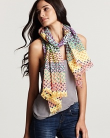Stand out in the crowd in this linen oblong scarf highlighting a pretty pattern and vibrant color palette. Stand out in the crowd in this linen oblong scarf highlighting a pretty pattern and vibrant color palette.