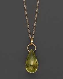 A faceted teardrop of verde, set in 14 Kt. yellow gold. A faceted teardrop of verde, set in 14 Kt. yellow gold.
