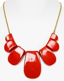 A little bit retro with a bold streak, this Trina Turk statement necklace channels vintage inspiration cast in 18-karat gold plate with madly Mod resin petal detailing. A little bit retro with a bold streak, this Trina Turk statement necklace channels vintage inspiration cast in 18-karat gold plate with madly Mod resin petal detailing.