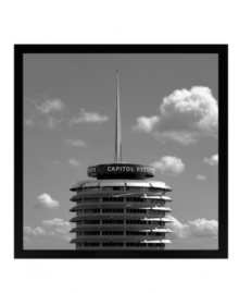 Rock out blank walls with the original Capitol Records building in Los Angeles. Like a stack of vinyl records, this historic landmark is captured in black and white for a retro-cool feel in framed canvas. Rock out blank walls with the original Capitol Records building in Los Angeles. Like a stack of vinyl records, this historic landmark is captured in black and white for a retro-cool feel in framed canvas.