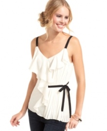 Charm like no other in Jessica Simpson's sweetly ruffled top. The pleated bodice and contrast-color accents add an abundance of elegant style. Charm like no other in Jessica Simpson's sweetly ruffled top. The pleated bodice and contrast-color accents add an abundance of elegant style.