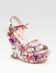 A secure slingback and adjustable ankle strap add comfort to this chic floral-printed patent leather contoured wedge. Self-covered wedge, 4¾ (120mm)Covered platform, 1½ (40mm)Compares to a 3¼ heel (80mm)Patent leather upperLeather liningRubber trek solePadded insoleMade in ItalyOUR FIT MODEL RECOMMENDS ordering one size up as this style runs small. A secure slingback and adjustable ankle strap add comfort to this chic floral-printed patent leather contoured wedge. Self-covered wedge, 4¾ (120mm)Covered platform, 1½ (40mm)Compares to a 3¼ heel (80mm)Patent leather upperLeather liningRubber trek solePadded insoleMade in ItalyOUR FIT MODEL RECOMMENDS ordering one size up as this style runs small.