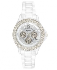 This boyfriend-inspired watch by Style&co. gets a girlie makeover in white on white. White-plated mixed metal bracelet and round case. Bezel embellished with crystal accents. White dial features numerals, stick indices, minute track, three multifunctional subdials, three hands and logo. Quartz movement. Two-year limited warranty.