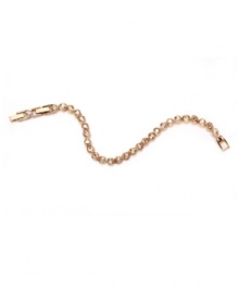 Sporty and stylish. With its glittering crystal embellishment, Swarovski's Golden Shadow tennis bracelet adds sparkle to your style. Crafted in gold tone mixed metal, it includes an extender for a comfortable, accurate fit. Approximate length: 7 inches. Sporty and stylish. With its glittering crystal embellishment, Swarovski's Golden Shadow tennis bracelet adds sparkle to your style. Crafted in gold tone mixed metal, it includes an extender for a comfortable, accurate fit. Approximate length: 7 inches.