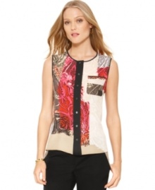 A mixed paisley print with bright painterly accents make this T Tahari Milan blouse perfect for adding a splash of color to your spring wardrobe! A mixed paisley print with bright painterly accents make this T Tahari Milan blouse perfect for adding a splash of color to your spring wardrobe!