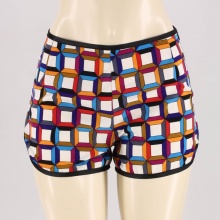 These vintage-inspired shorts featurea bright cubist print. These vintage-inspired shorts featurea bright cubist print.